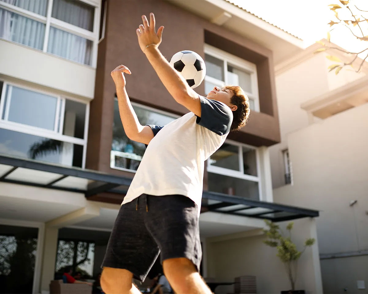 Boy playing soccer